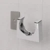Purus Clips avloppsklammer med limmad adapter på kaklad badrumsvägg