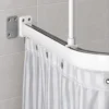 Leijma draperistång med limmad adapter på kaklad badrumsvägg